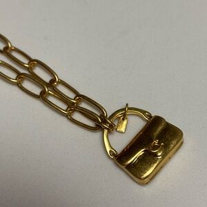 Coach Gold-Tone Chain Charm with Purse Motif Bracelet & Necklace